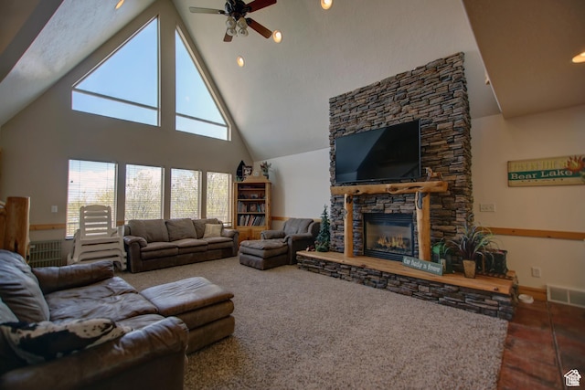2310 S Sweetwater Pkwy Unit 5, Garden City, UT 84028 - carpeted living room featuring a ceiling fan, a fireplace, and high vaulted ceiling