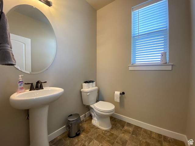 bathroom featuring sink and toilet