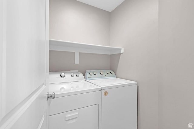 washroom featuring independent washer and dryer