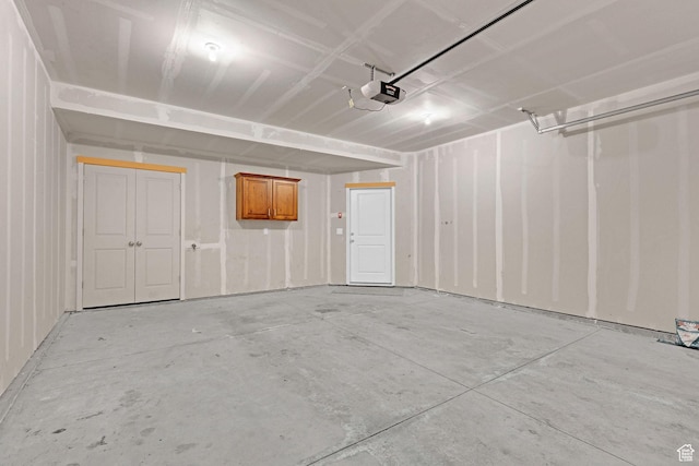 garage featuring a garage door opener