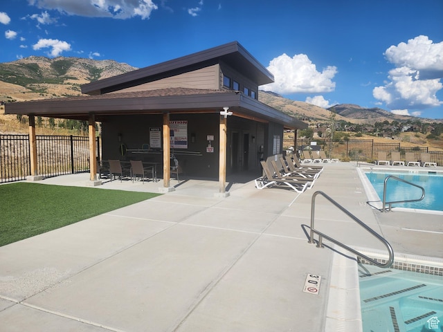 5211 Moose Hollow Dr Unit 302, Eden, UT 84310 - view of pool featuring a mountain view and a patio