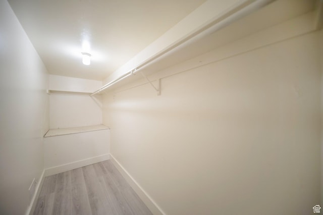 2220 E Murray Holladay Rd Unit 122, Salt Lake City, UT 84117 - spacious closet featuring light wood-type flooring