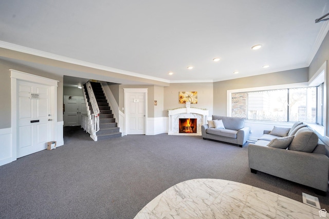 2220 E Murray Holladay Rd Unit 122, Salt Lake City, UT 84117 - living area with dark carpet, ornamental molding, stairway, a fireplace, and recessed lighting