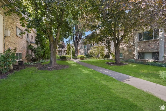 2220 E Murray Holladay Rd Unit 122, Salt Lake City, UT 84117 - view of community featuring a yard