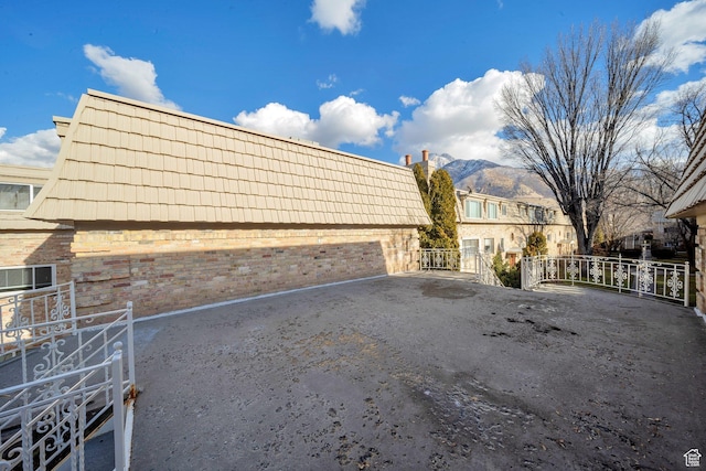 2220 E Murray Holladay Rd Unit 122, Salt Lake City, UT 84117 - garage featuring a mountain view