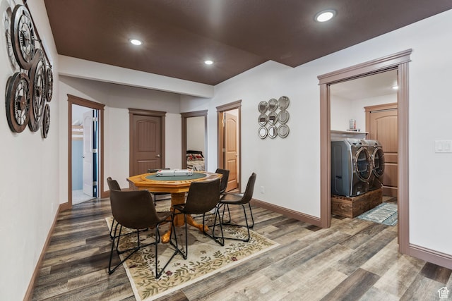 2923 S Country Club Way Unit 46, Garden City, UT 84028 - dining space featuring separate washer and dryer, baseboards, wood finished floors, and recessed lighting
