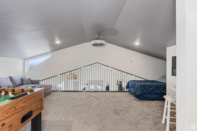 2923 S Country Club Way Unit 46, Garden City, UT 84028 - recreation room featuring carpet floors, vaulted ceiling, recessed lighting, and a textured ceiling