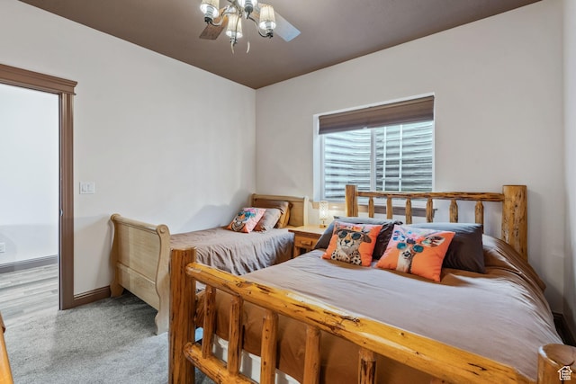 2923 S Country Club Way Unit 46, Garden City, UT 84028 - bedroom featuring carpet floors, ceiling fan, and baseboards
