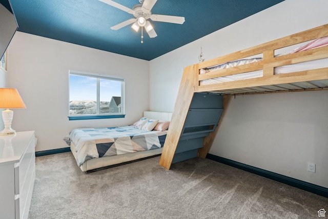 2923 S Country Club Way Unit 46, Garden City, UT 84028 - carpeted bedroom featuring baseboards and a ceiling fan