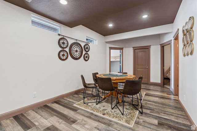 2923 S Country Club Way Unit 46, Garden City, UT 84028 - dining room featuring wood finished floors, baseboards, recessed lighting, and a textured ceiling