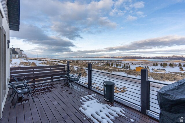 2923 S Country Club Way Unit 46, Garden City, UT 84028 - snow covered deck with a mountain view and grilling area