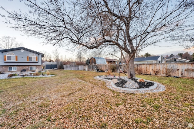 556 W 1050 N, Pleasant Grove, UT 84062 - view of yard with an outdoor structure and fence