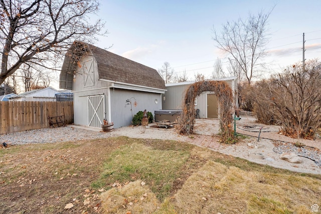 556 W 1050 N, Pleasant Grove, UT 84062 - view of yard with an outdoor structure, a hot tub, fence, a patio, and a barn