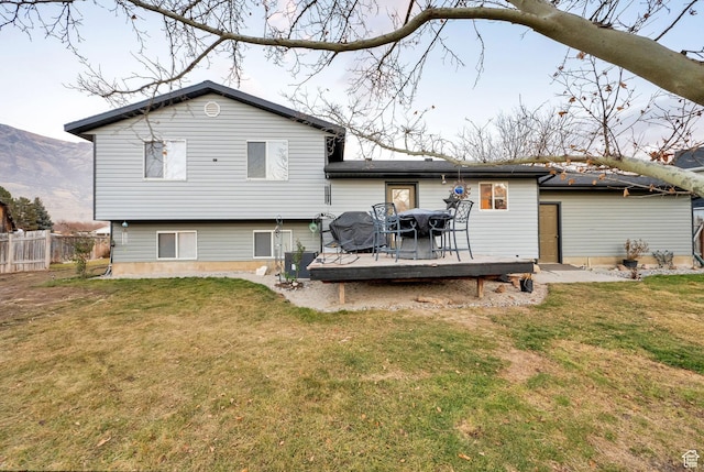 556 W 1050 N, Pleasant Grove, UT 84062 - rear view of house with a lawn, a wooden deck, and fence