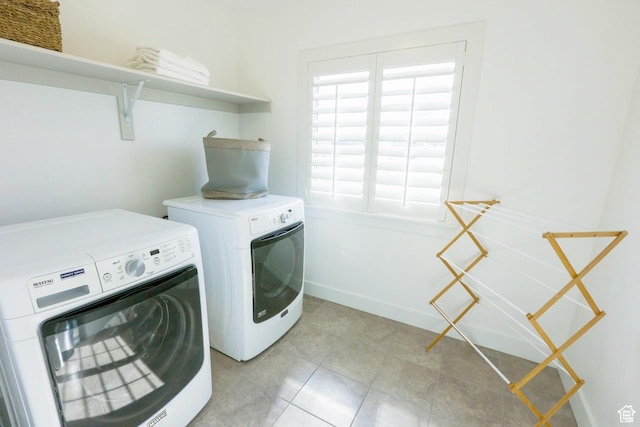 3234 S Iron Hill Cir S, Saratoga Springs, UT 84045 - laundry area with washing machine and dryer and light tile patterned flooring