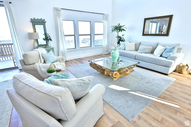 3234 S Iron Hill Cir S, Saratoga Springs, UT 84045 - living room featuring wood finished floors