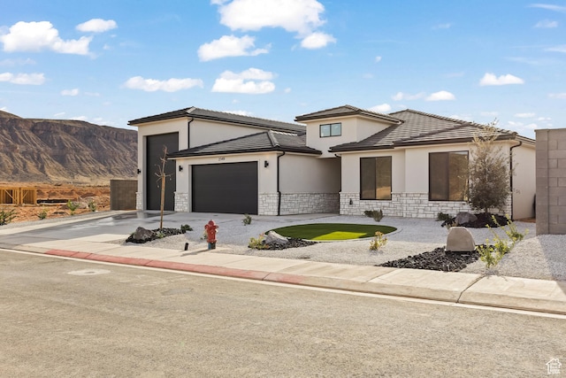 2149 W 3930 S, Hurricane, UT 84737 - prairie-style home featuring stucco siding, a garage, stone siding, and concrete driveway