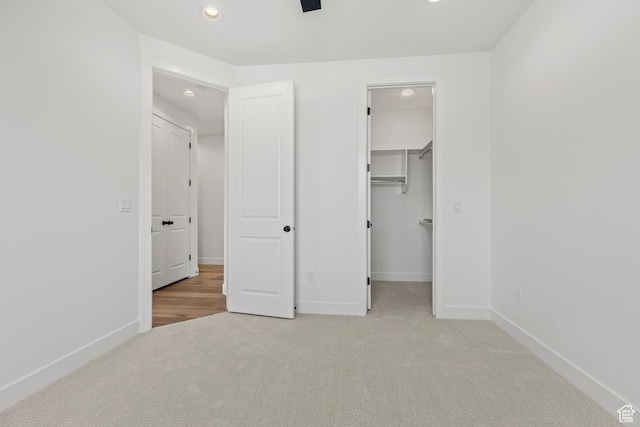 2149 W 3930 S, Hurricane, UT 84737 - unfurnished bedroom featuring carpet flooring, recessed lighting, baseboards, and a spacious closet