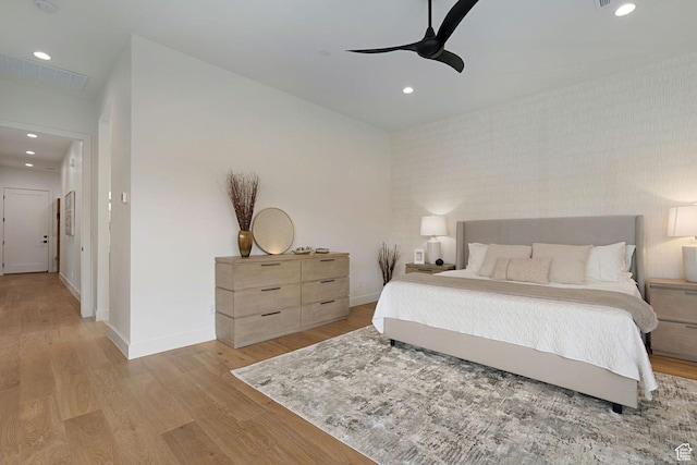 bedroom featuring ceiling fan and light wood-type flooring