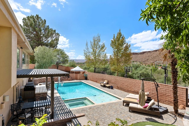 2712 S Rio Vista Dr, St George, UT 84790 - view of swimming pool with a patio area and an in ground hot tub