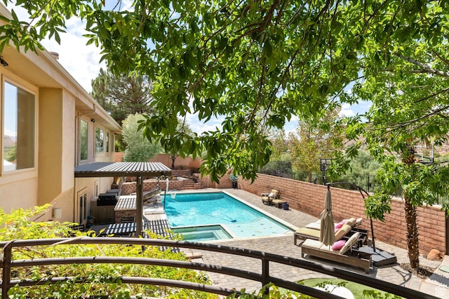 2712 S Rio Vista Dr, St George, UT 84790 - view of swimming pool featuring a patio area and an in ground hot tub