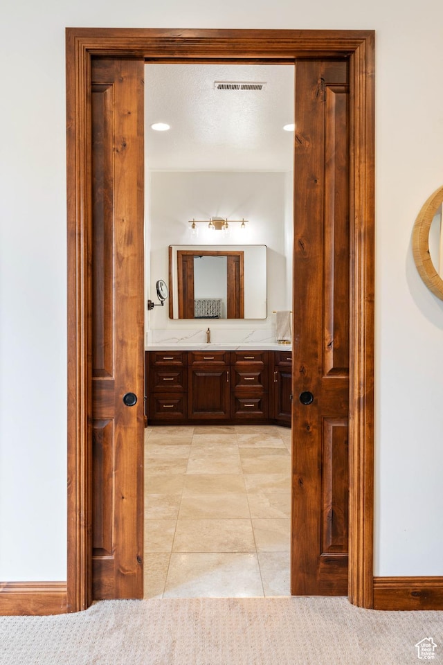 2712 S Rio Vista Dr, St George, UT 84790 - bathroom with tile patterned flooring and vanity