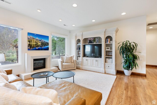 2712 S Rio Vista Dr, St George, UT 84790 - living room with light hardwood / wood-style floors and a wealth of natural light