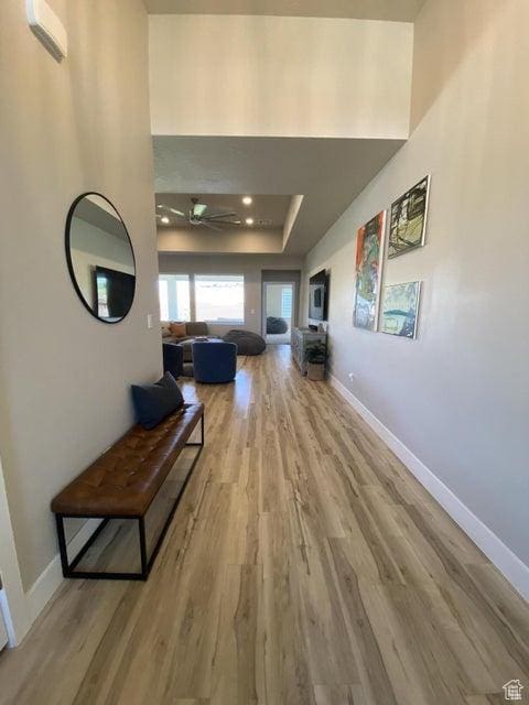 hallway with wood-type flooring
