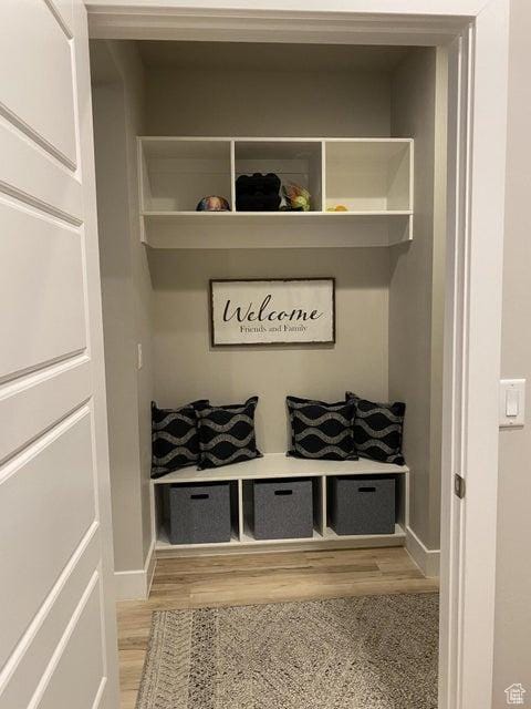 mudroom with light hardwood / wood-style flooring