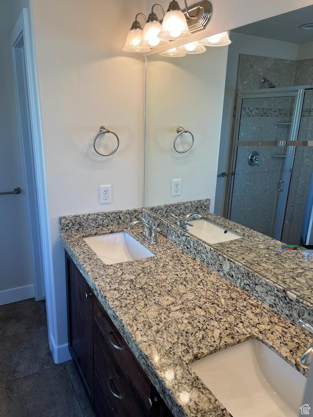 bathroom with vanity and walk in shower