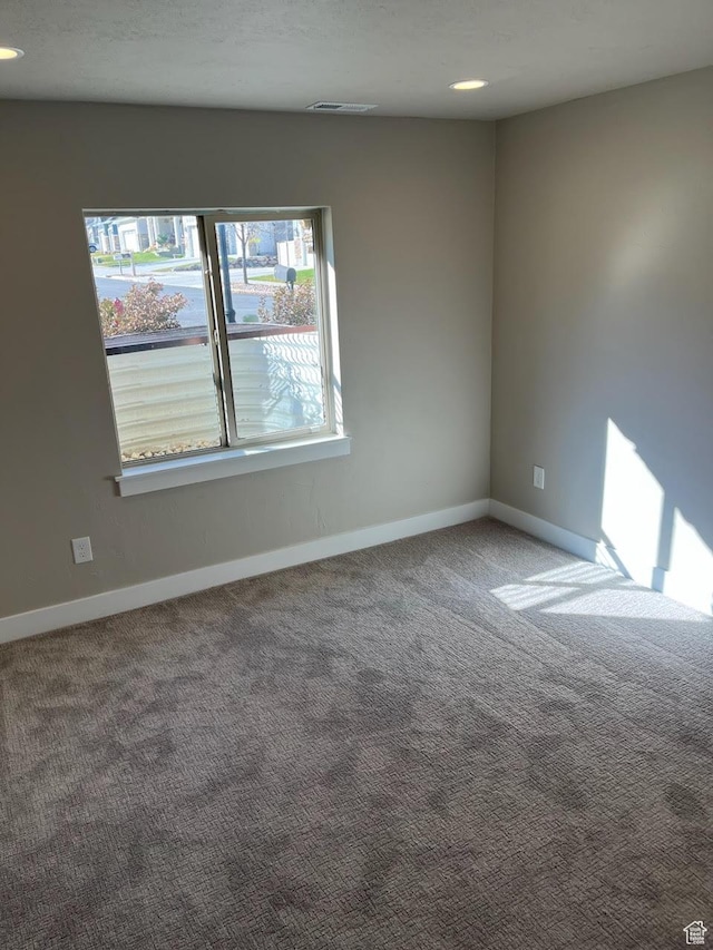 empty room with carpet floors