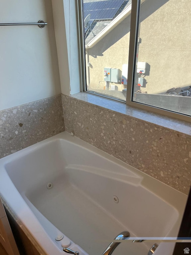 bathroom with a bath