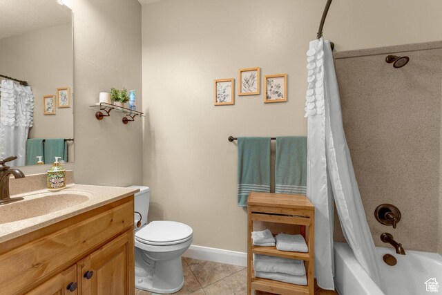 full bathroom featuring tile patterned floors, vanity, shower / bath combo, and toilet