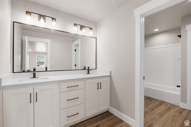 525 N 1550 W Unit Ge01, Mapleton, UT 84664 - full bath with double vanity, a sink, baseboards, and wood finished floors