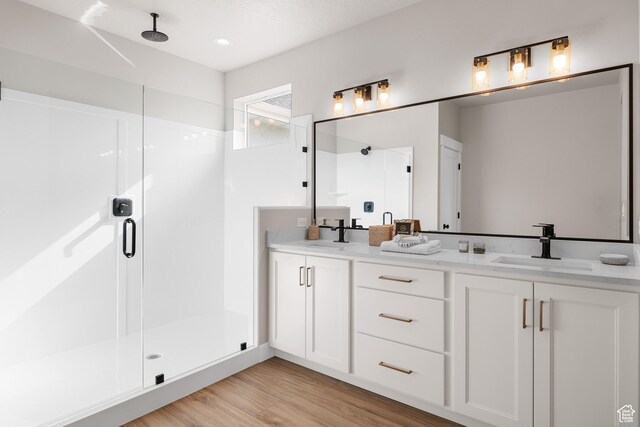 525 N 1550 W Unit Ge01, Mapleton, UT 84664 - full bath with double vanity, a shower stall, a sink, and wood finished floors