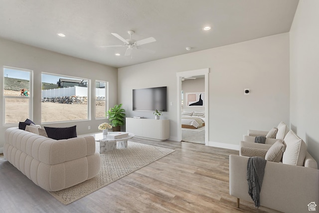 5401 N Orville St Unit 426, Eagle Mountain, UT 84005 - living area with light wood finished floors, recessed lighting, baseboards, and a ceiling fan