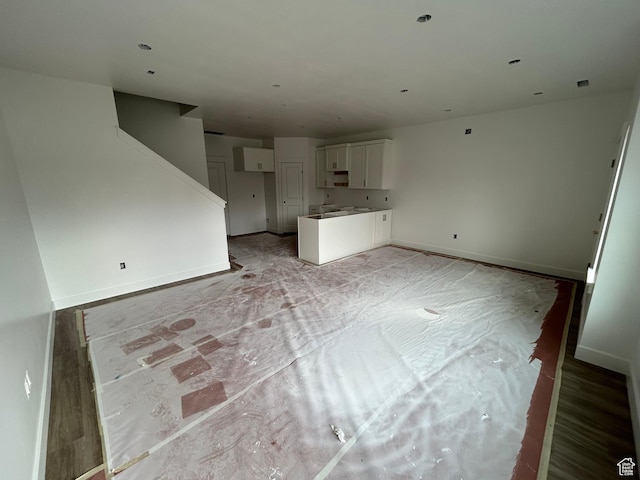 206 W 3175 S Unit T610, Nibley, UT 84321 - unfurnished living room with baseboards and stairs