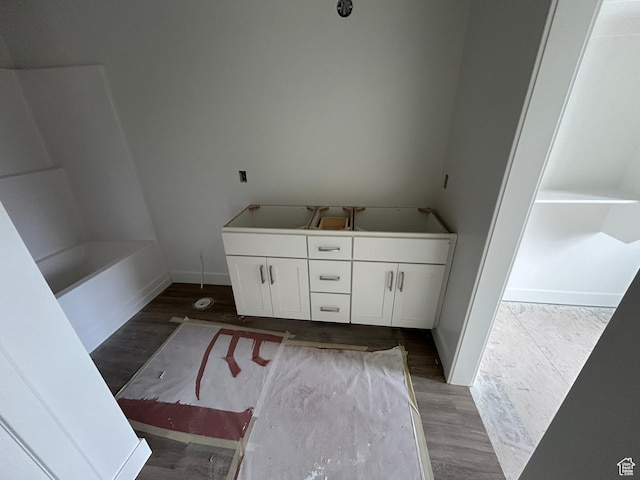 206 W 3175 S Unit T610, Nibley, UT 84321 - full bathroom featuring wood finished floors, baseboards, and a bathtub