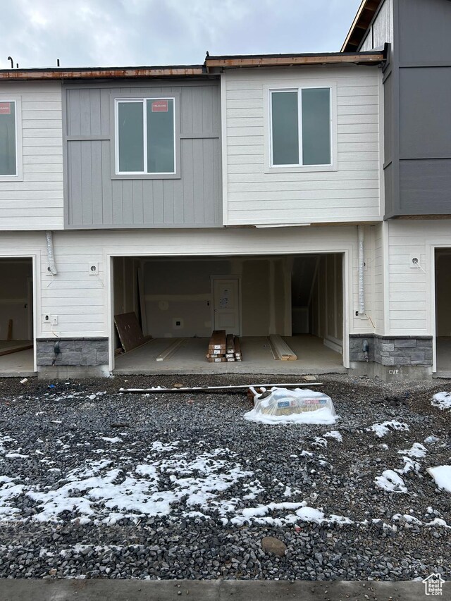 206 W 3175 S Unit T610, Nibley, UT 84321 - back of property with a patio and an outdoor fire pit