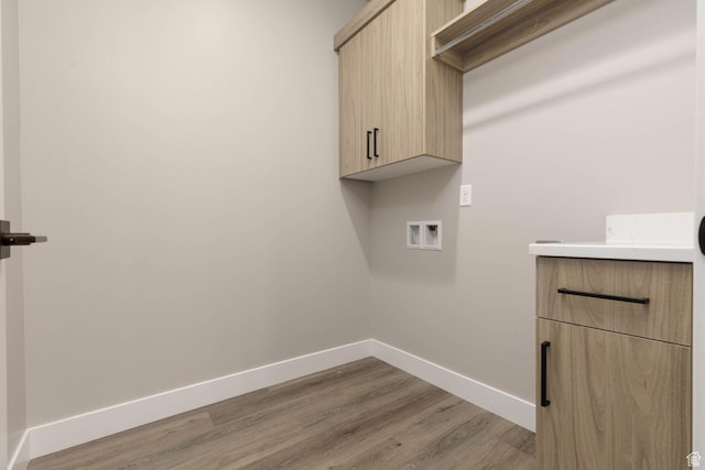 2227 W 320 S, Hurricane, UT 84737 - laundry room featuring cabinets, washer hookup, and light hardwood / wood-style floors