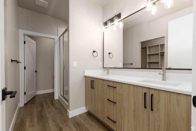 2227 W 320 S, Hurricane, UT 84737 - bathroom featuring vanity, hardwood / wood-style flooring, and a shower with shower door