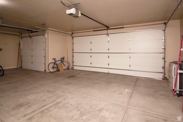 2596 S Little Valley Rd, St George, UT 84790 - garage featuring a garage door opener