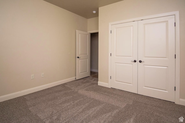 2596 S Little Valley Rd, St George, UT 84790 - unfurnished bedroom featuring carpet flooring and a closet