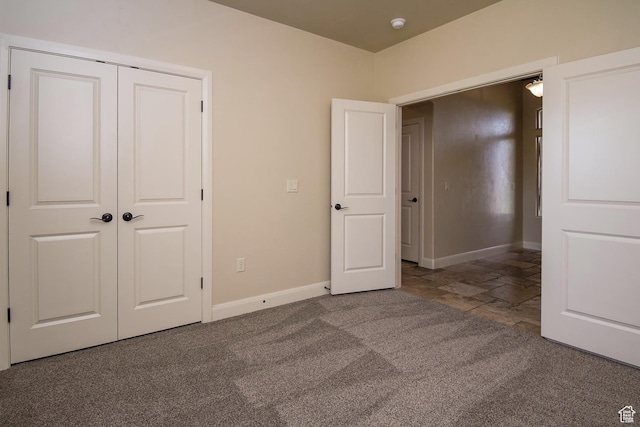 2596 S Little Valley Rd, St George, UT 84790 - unfurnished bedroom featuring a closet and carpet