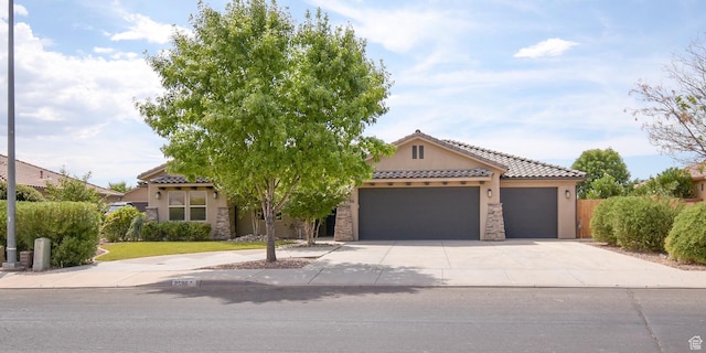 2596 S Little Valley Rd, St George, UT 84790 - mediterranean / spanish-style house with a garage