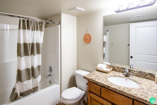 2511 Redcliff Rd Unit 1D, Moab, UT 84532 - bathroom with shower / bath combo, vanity, and a textured ceiling