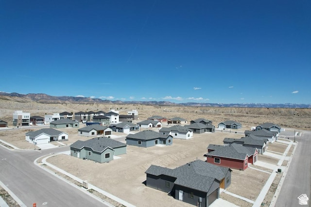bird's eye view with a mountain view