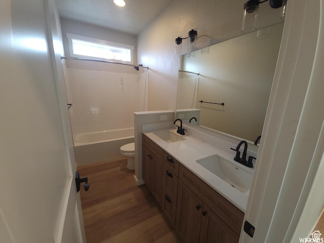 full bathroom featuring vanity, shower / bathtub combination, toilet, and wood-type flooring