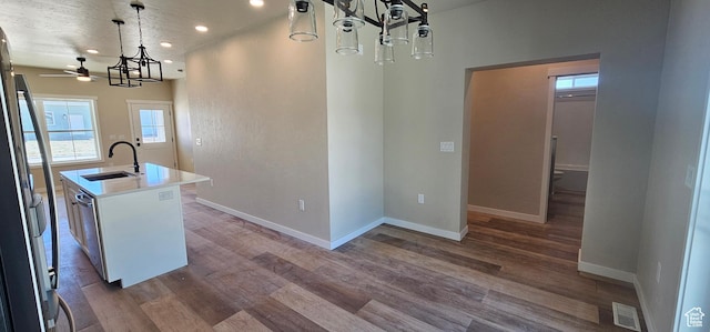 831 N 1820 E Unit 66, Price, UT 84501 - kitchen featuring a center island with sink, sink, hanging light fixtures, stainless steel refrigerator with ice dispenser, and ceiling fan