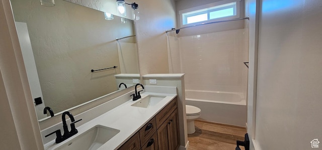 831 N 1820 E Unit 66, Price, UT 84501 - full bathroom featuring wood-type flooring, vanity, toilet, and shower / washtub combination